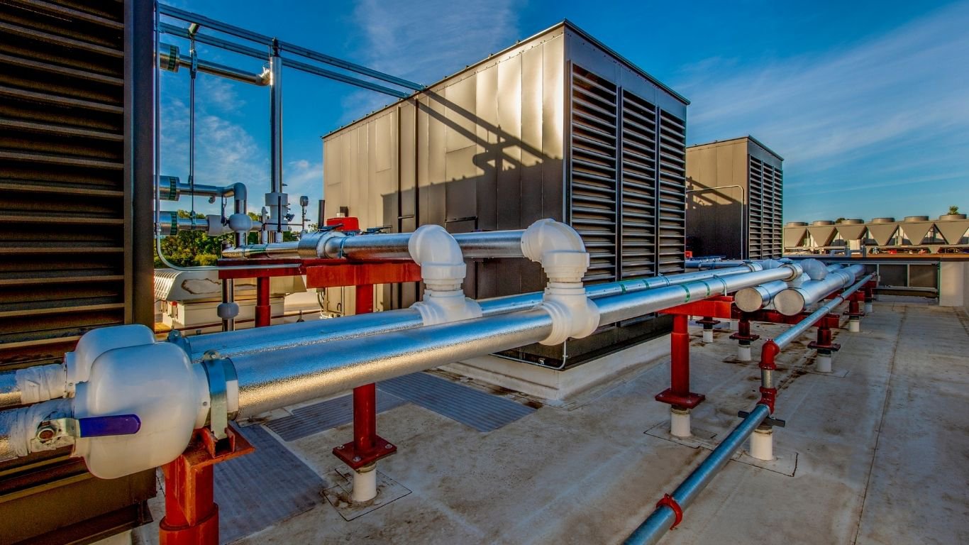 Pipes connected to a large manufacturing facility