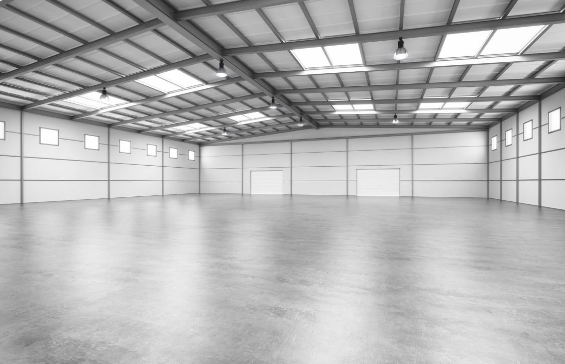 Empty warehouse with a high ceiling for building heat loss calculations
